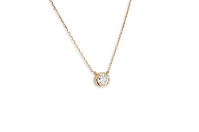 Lot 208 - A DIAMOND SOLITAIRE PENDANT, the round...