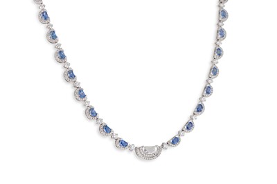 Lot 323 - AN INTERESTING SAPPHIRE AND DIAMOND SET...