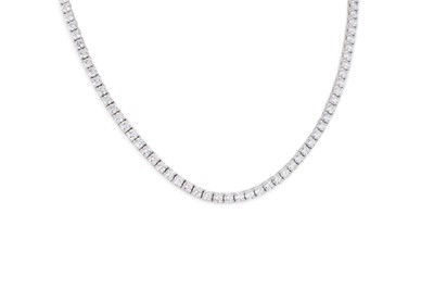 Lot 325 - A DIAMOND LINE NECKLACE, the brilliant cut...