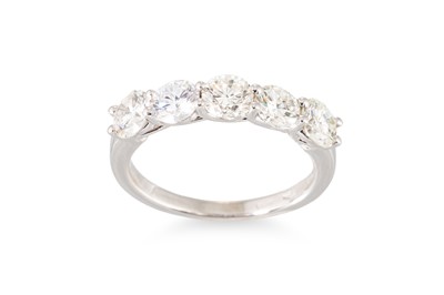 Lot 211 - A FIVE STONE DIAMOND RING, the round brilliant...