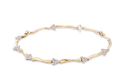 Lot 268 - A DIAMOND BRACELET, comprising triangular...