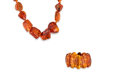 Lot 271 - A RESIN NECKLACE, together with a similar...