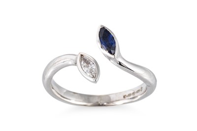 Lot 125 - A SAPPHIRE AND DIAMOND SET RING, the bezel set...