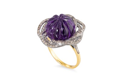 Lot 249 - AN AMETHYST AND DIAMOND RING, the carved...