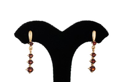 Lot 18 - A PAIR OF GARNET DROP EARRINGS, the round cut...