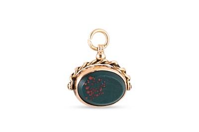 Lot 21 - AN ANTIQUE SWIVEL SEAL, set with bloodstone...