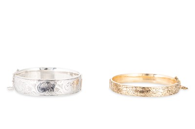 Lot 52 - A 9CT GOLD CORE METAL BANGLE, together with a...