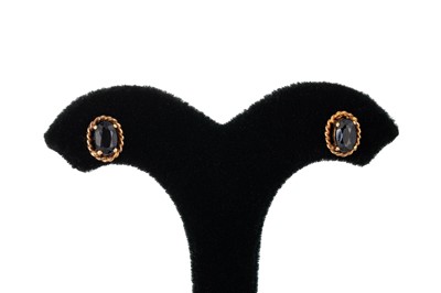 Lot 79 - A PAIR OF SAPPHIRE STUD EARRINGS, the oval...