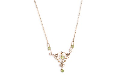 Lot 355 - A 9CT GOLD ANTIQUE PERIDOT AND SEED PEARL...