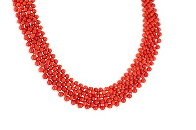 Lot 281 - A CORAL BEADED CHOKER NECKLACE, to a floral...