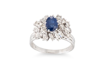 Lot 283 - A VINTAGE SAPPHIRE AND DIAMOND CLUSTER RING,...