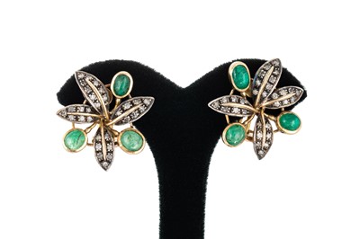 Lot 306 - A PAIR OF VINTAGE EMERALD AND DIAMOND CLUSTER...