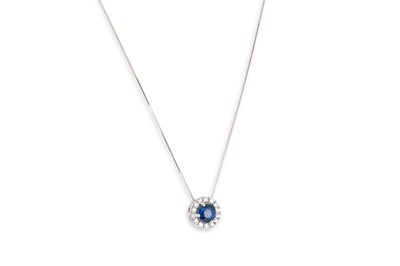 Lot 307 - A SAPPHIRE AND DIAMOND CLUSTER PENDANT, the...