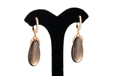 Lot 315 - A PAIR OF DIAMOND AND SMOKY QUARTZ DROP...
