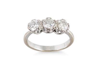 Lot 171 - A THREE STONE DIAMOND RING, mounted in 18ct...