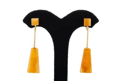 Lot 82 - A PAIR OF JADE DROP EARRINGS, the 'orange jade'...
