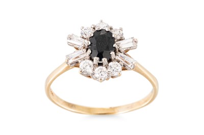 Lot 83 - A SAPPHIRE AND STONE SET CLUSTER RING, the...