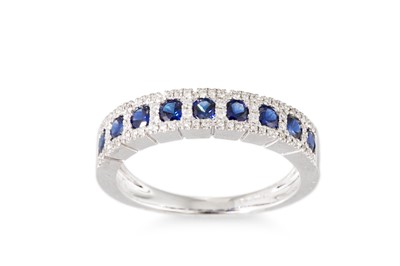 Lot 108 - A DIAMOND AND SAPPHIRE HALF ETERNITY RING, the...