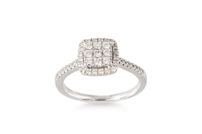 Lot 111 - A DIAMOND CLUSTER RING, the round cut diamonds...