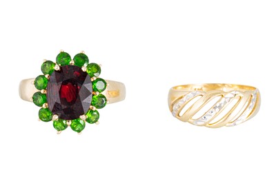 Lot 334 - A 9CT YELLOW GOLD GARNET AND GEMSET RING,...
