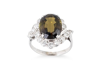 Lot 182 - AN ANDALUSITE AND DIAMOND CLUSTER RING, the...
