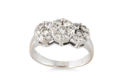 Lot 316 - A DIAMOND TRIPLE CLUSTER RING, mounted in 14ct...