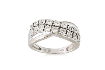 Lot 317 - A TWO ROWED DIAMOND RING, wavy illusion design,...