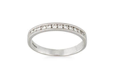 Lot 320 - A DIAMOND HALF ETERNITY RING, mounted in...