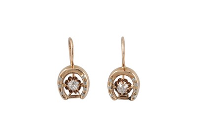 Lot 111 - A PAIR OF DIAMOND EARRINGS, the horseshoe...