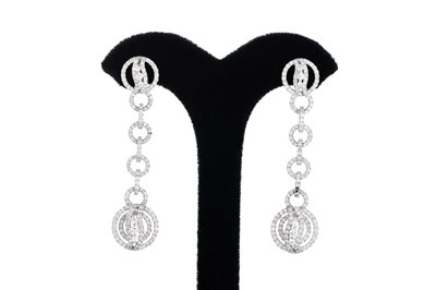 Lot 261 - A PAIR OF DIAMOND DROP EARRINGS, mounted in...