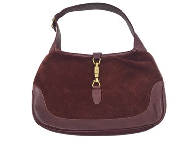 Lot 493 - A VINTAGE GUCCI LADY'S HANDBAG, burgundy...