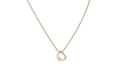 Lot 250 - AN 18CT YELLOW GOLD HEART PENDANT, with an...