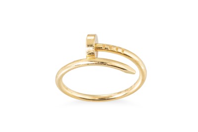 Lot 280 - A CARTIER JUSTE UN CLOU RING,  mounted in 18ct...