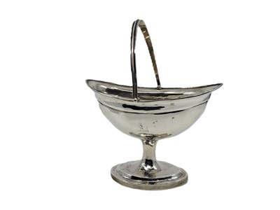 Lot 460 - A GEORGE III IRISH SILVER (.925) HELMET SUGAR...