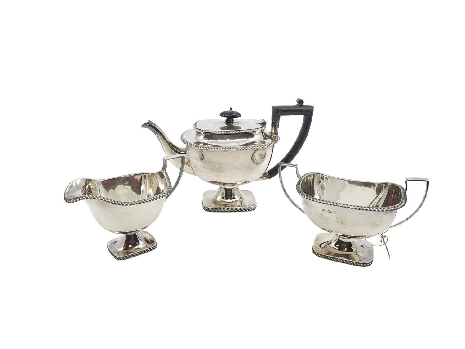 Lot 465 - A LATE VICTORIAN THREE-PIECE TEA SET, to...