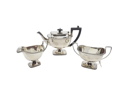 Lot 465 - A LATE VICTORIAN THREE-PIECE TEA SET, to...