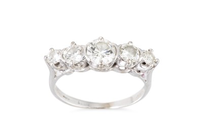 Lot 265 - A FIVE STONE DIAMOND RING, the brilliant cut...