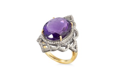 Lot 47 - A DIAMOND AND AMETHYST RING, the oval amethyst...