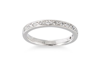 Lot 92 - A DIAMOND HALF ETERNITY RING, pavé set diamond...