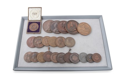 Lot 383 - A COLLECTION OF TWENTY-TWO LARGE COPPER IRISH...