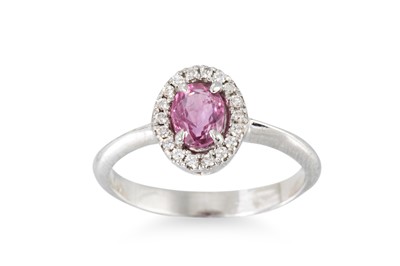 Lot 57 - A DIAMOND AND PINK TOURMALINE CLUSTER RING,...