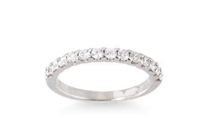 Lot 61 - A DIAMOND HALF ETERNITY RING, the round...