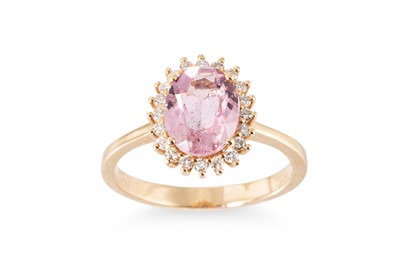 Lot 72 - A PINK TOURMALINE AND DIAMOND SET CLUSTER RING,...