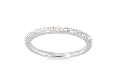 Lot 163 - A DIAMOND SET HALF ETERNITY RING, mounted in...