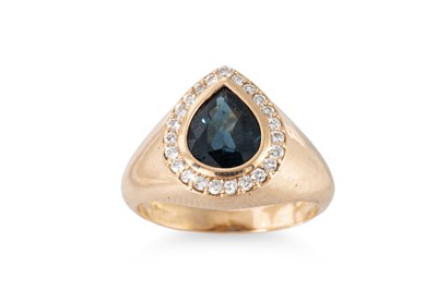 Lot 165 - A SAPPHIRE AND DIAMOND CLUSTER RING, the pear...