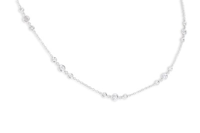 Lot 176 - A DIAMOND SET CHAIN NECKLACE, the collet set...