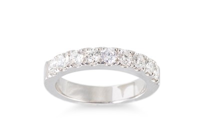 Lot 212 - A DIAMOND SET HALF ETERNITY RING, the...