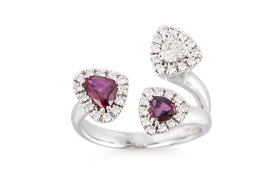 Lot 223 - A RUBY AND DIAMOND SET SPLIT SHANK RING,...