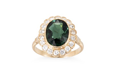 Lot 189 - A GREEN TOURMALINE AND DIAMOND CLUSTER RING,...