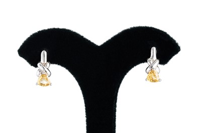 Lot 25 - A PAIR OF CITRINE DROP EARRINGS, the trillion...
